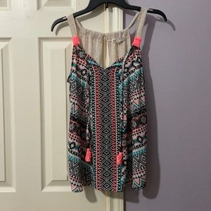 Tank top in a size medium color blue pink black